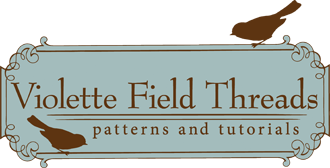 Violette Field Threads Logo