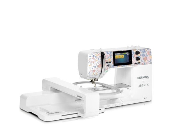 119303: Bernina B580E LE Liberty Edition Sewing +SDT Embroidery Module Machine, 147 Stitch. 91 Liberty, Matching Luggage & Cover, 8Feet, Knee Lift, DC motor, 110/220v