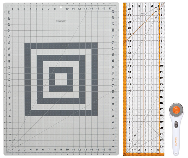 Fiskars 195230 Rotary Cutting 3pc Set 45mm Rotary Cutter, 6in x 24in Acrylic Quilting Ruler, and 18in x 24in Cutting Mat
