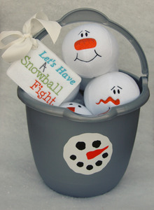 We wrapped a set of snowballs inside of a bucket in cellophane for a gift and it was adorable.